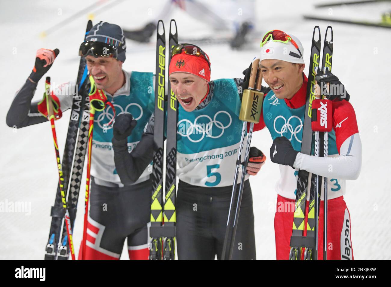 (R-L) Japan's Akito Watabe, silver, Germany's Eric FRENZEL, gold and