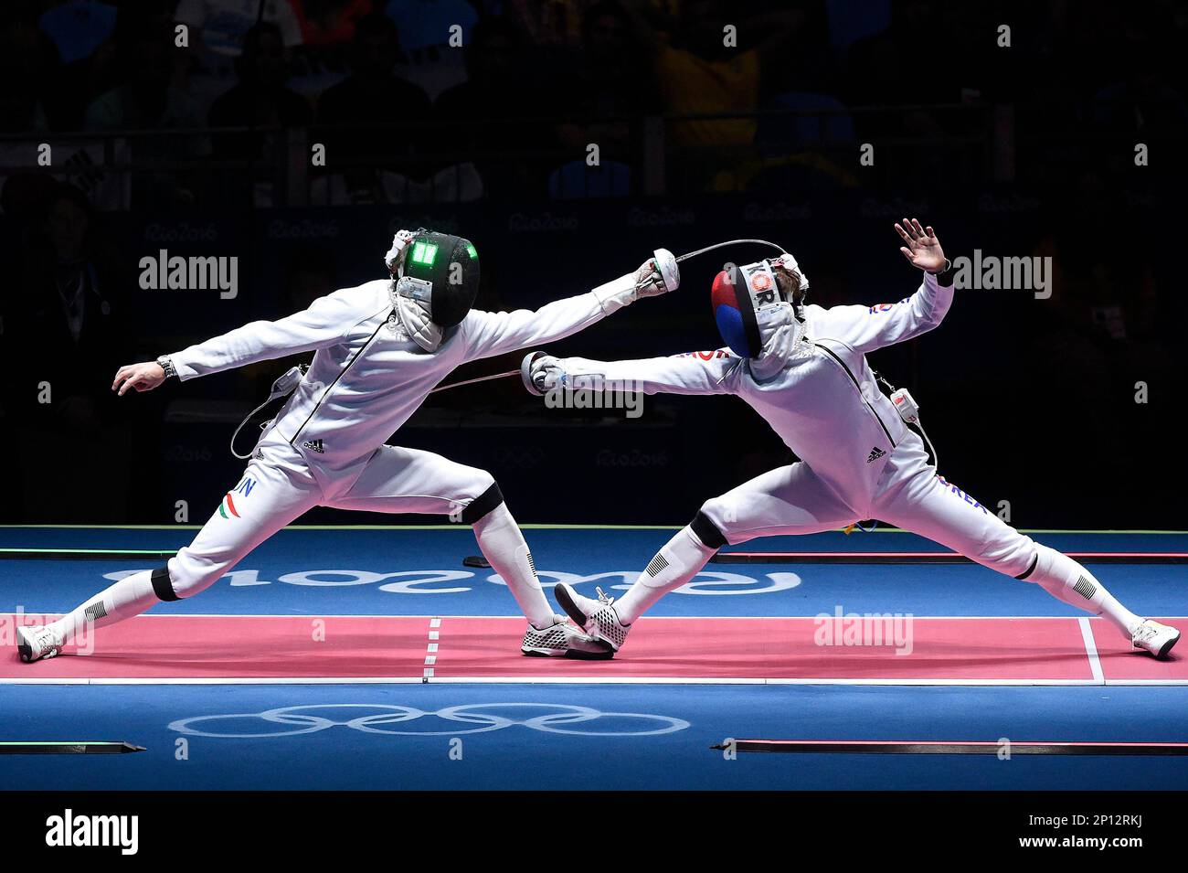 Geza Imre of Hungary, left, competes against Park KyoungDoo of South