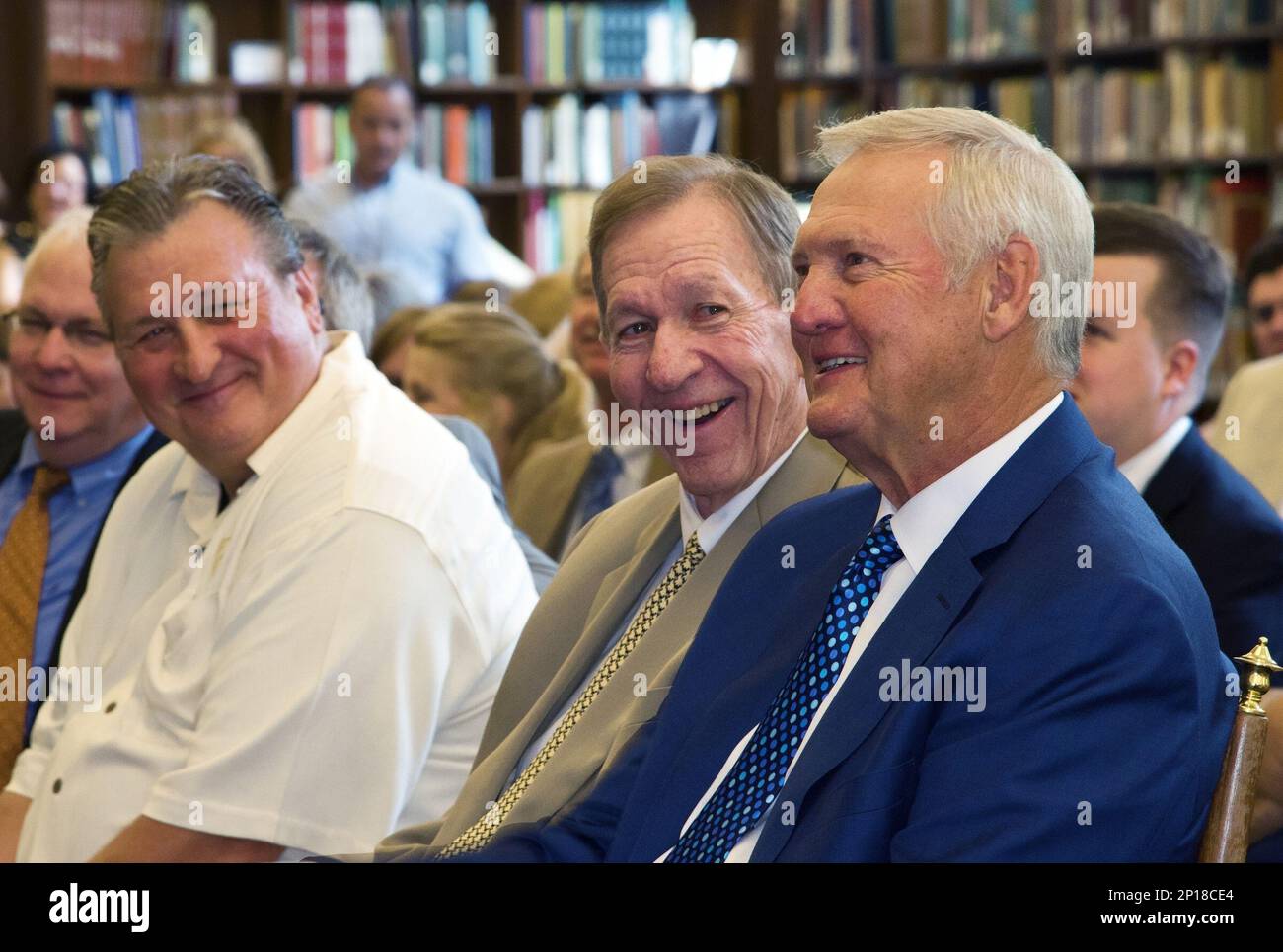 Former West Virginia University and NBA legend Jerry West, right