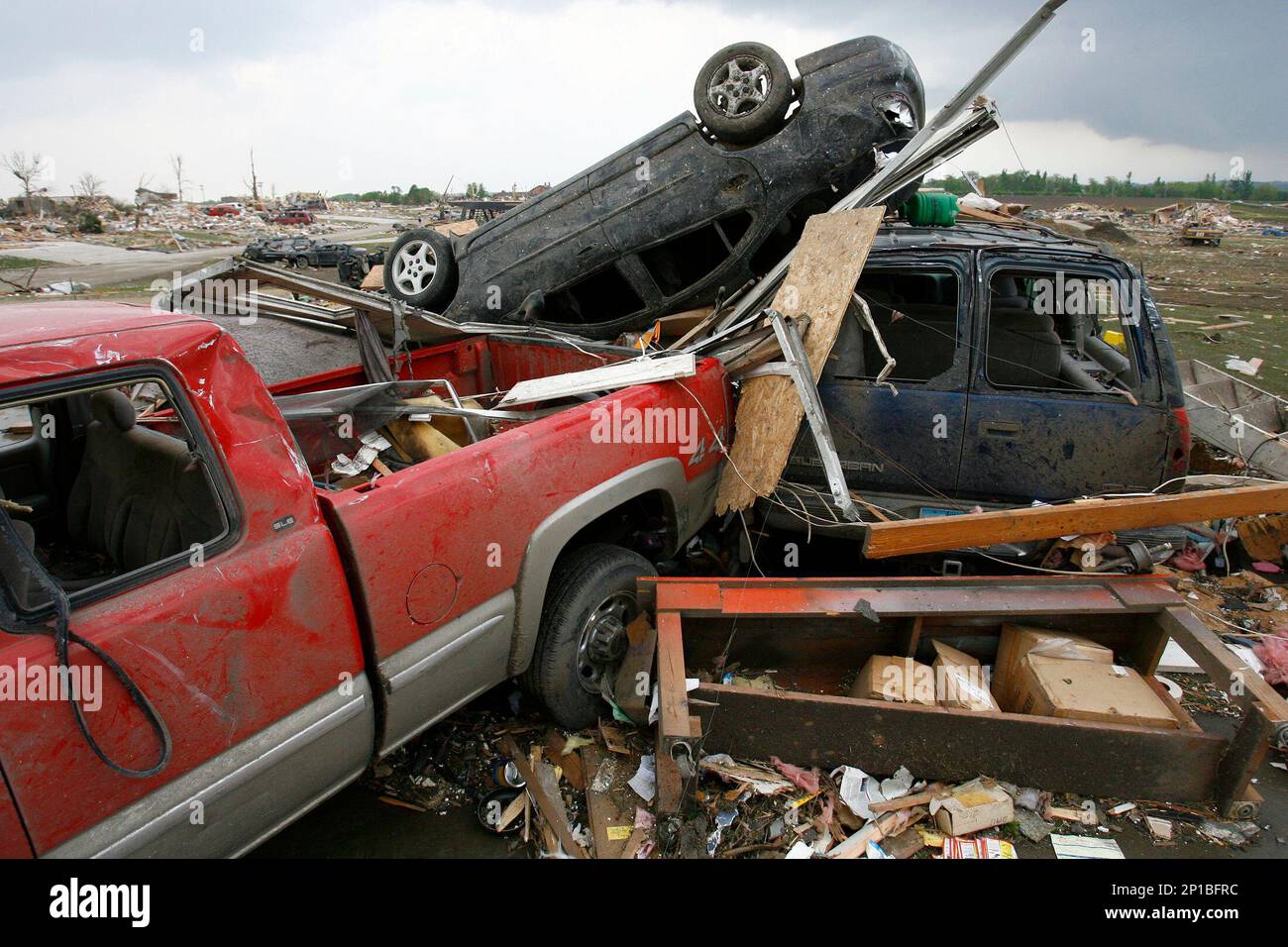 This May 25, 2008 photo shows a car flipped upside down on top of a van
