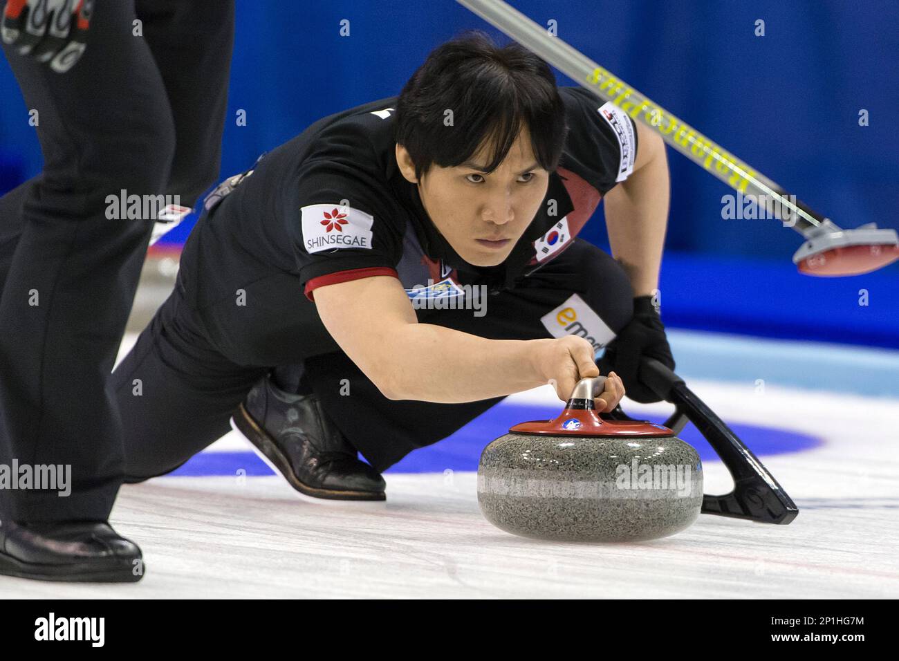 Korea's skip Kim Soohyuk competes in a round robin match between South