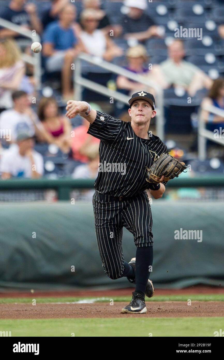 Vanderbilt Commodores third baseman Will Toffey (10) makes a throw to first base during the NCAA