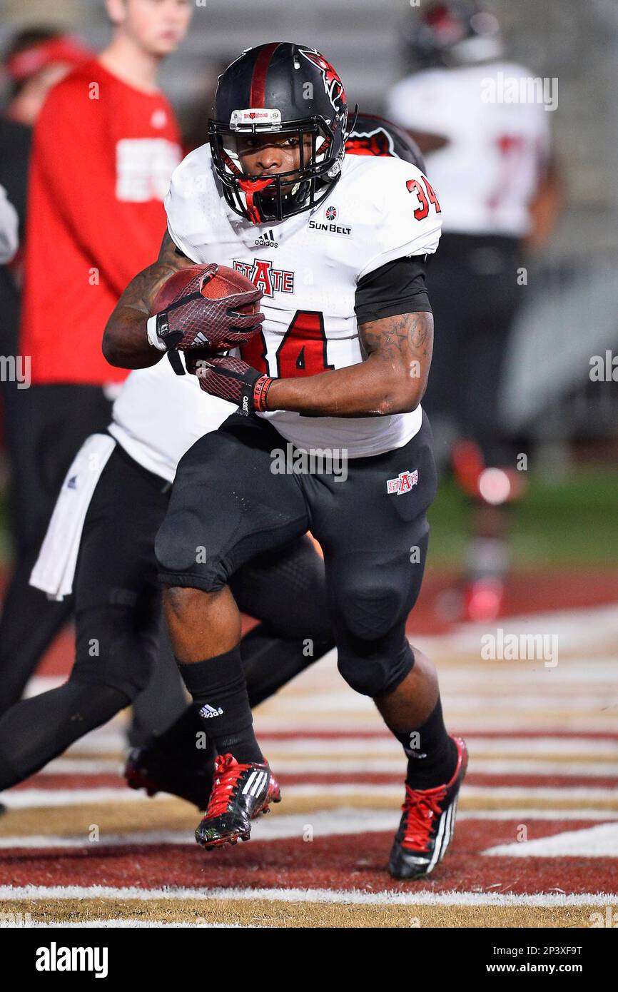 Arkansas State running back Michael Gordon (34) warm up before an NCAA
