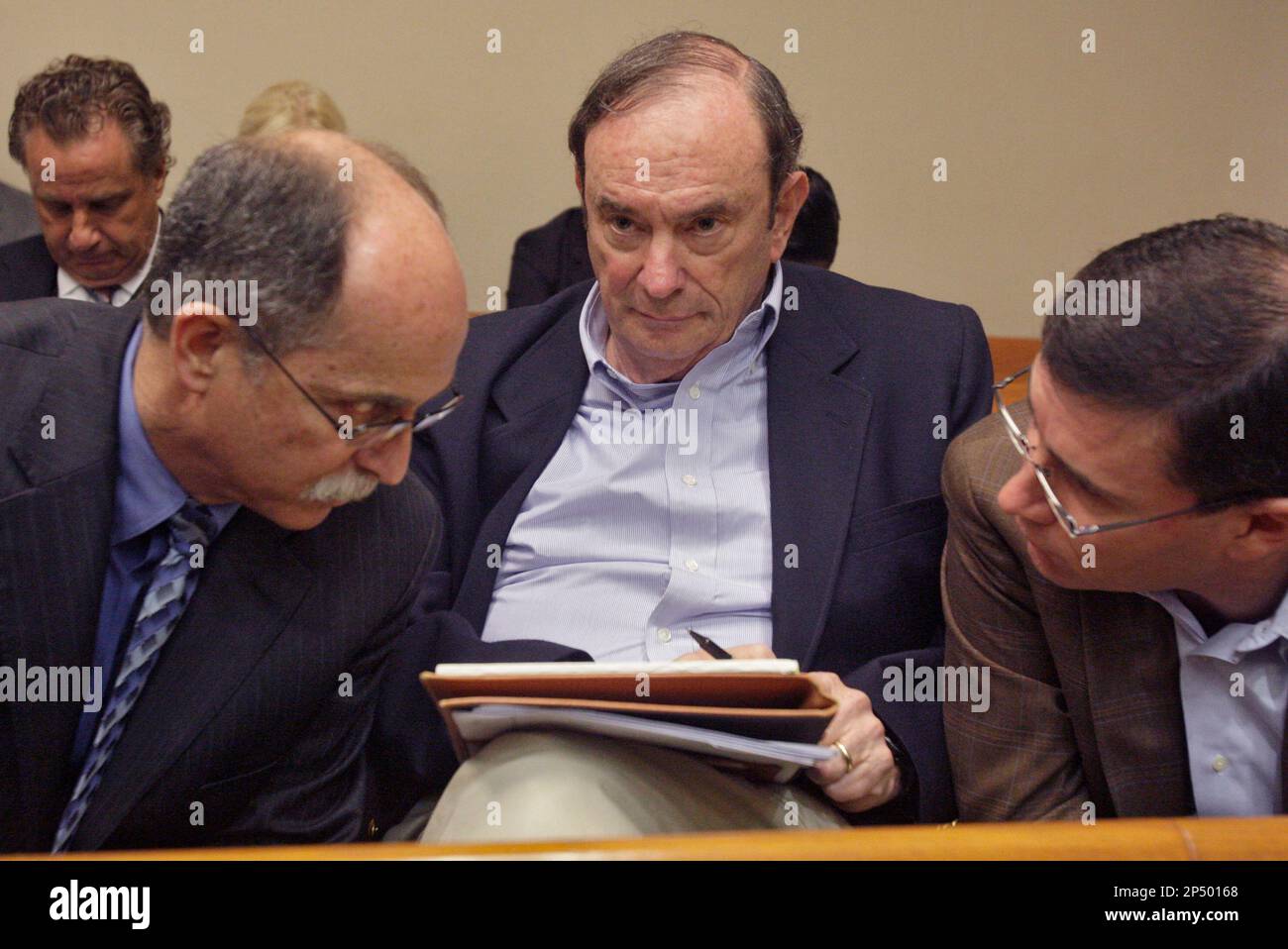 From left, Dekalb county prosecutor Don Geary talks with Don and Steve