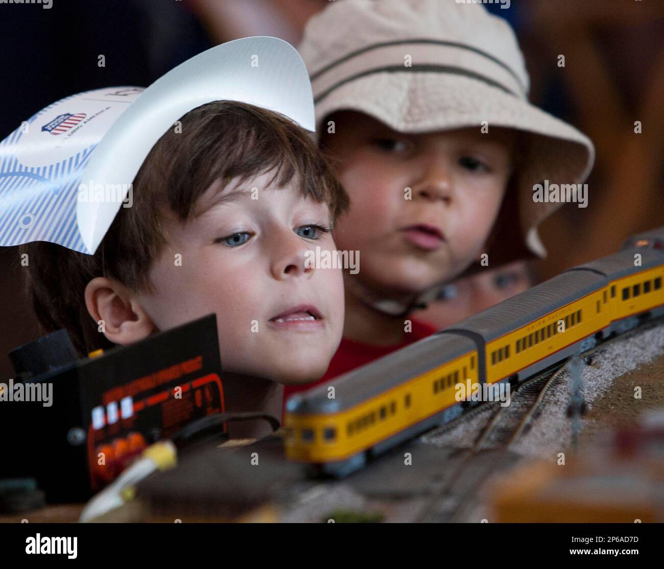 Jack Cornell, 5, Boise, and Reid Eichberg, 5, Boise, right, watch in