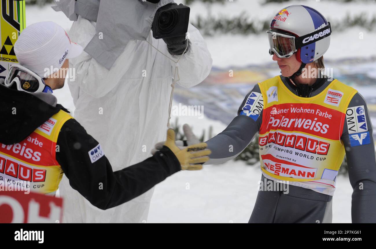 Austria S Ski Jumpers Andreas Kofler Left Congratulates Last Team Jumper Gregor Schlierenzauer