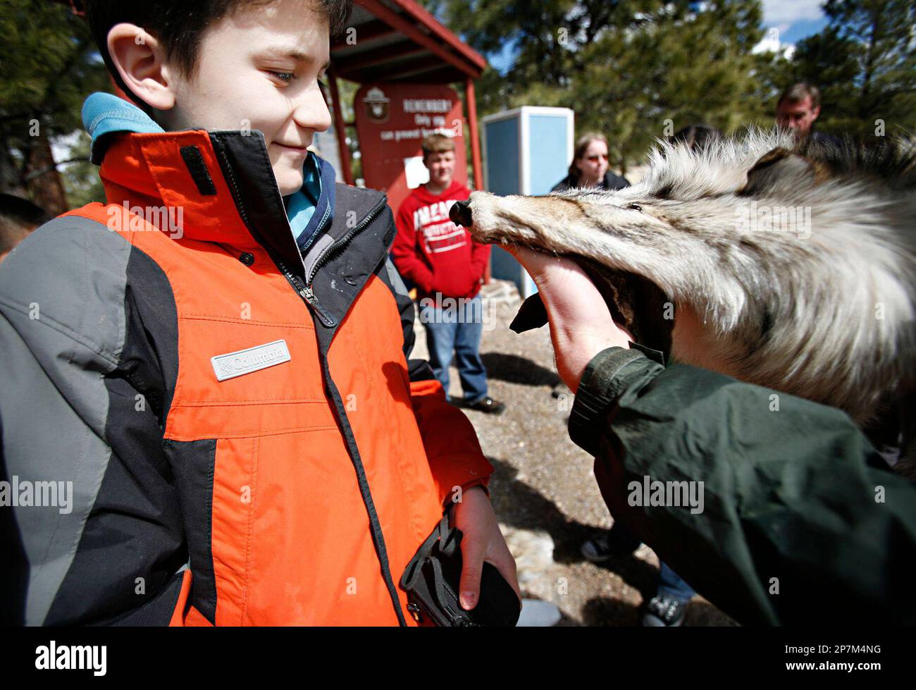 Las Cruces student Logan Richards,11, takes a close look at the head of