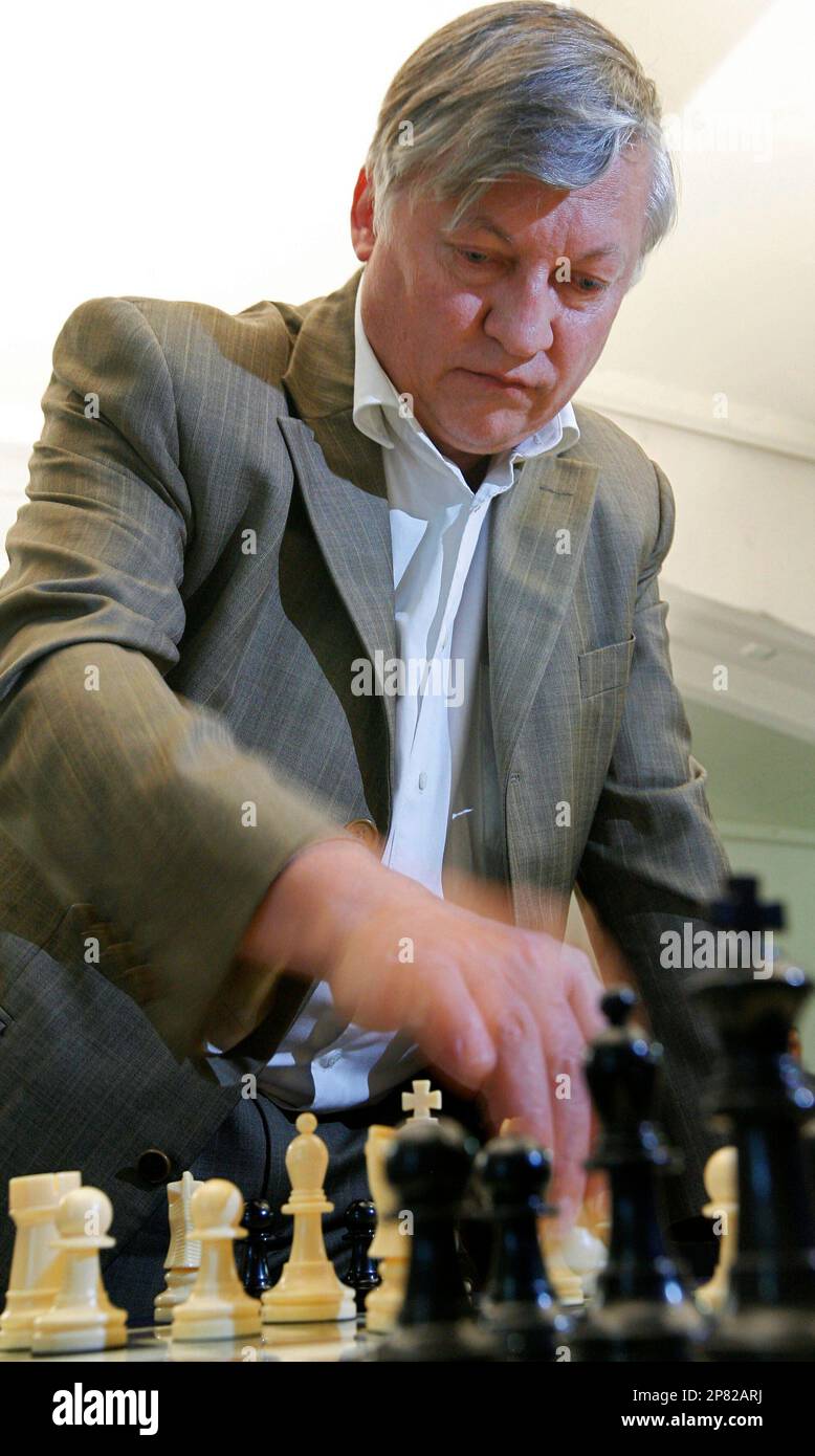 Former chess world champions Garry Kasparov, right, and Anatoly Karpov,  left, play an exhibition rematch in Valencia, Spain, Tuesday, Sept. 22,  2009. Chess eminences Kasparov and Karpov are dusting off their knights