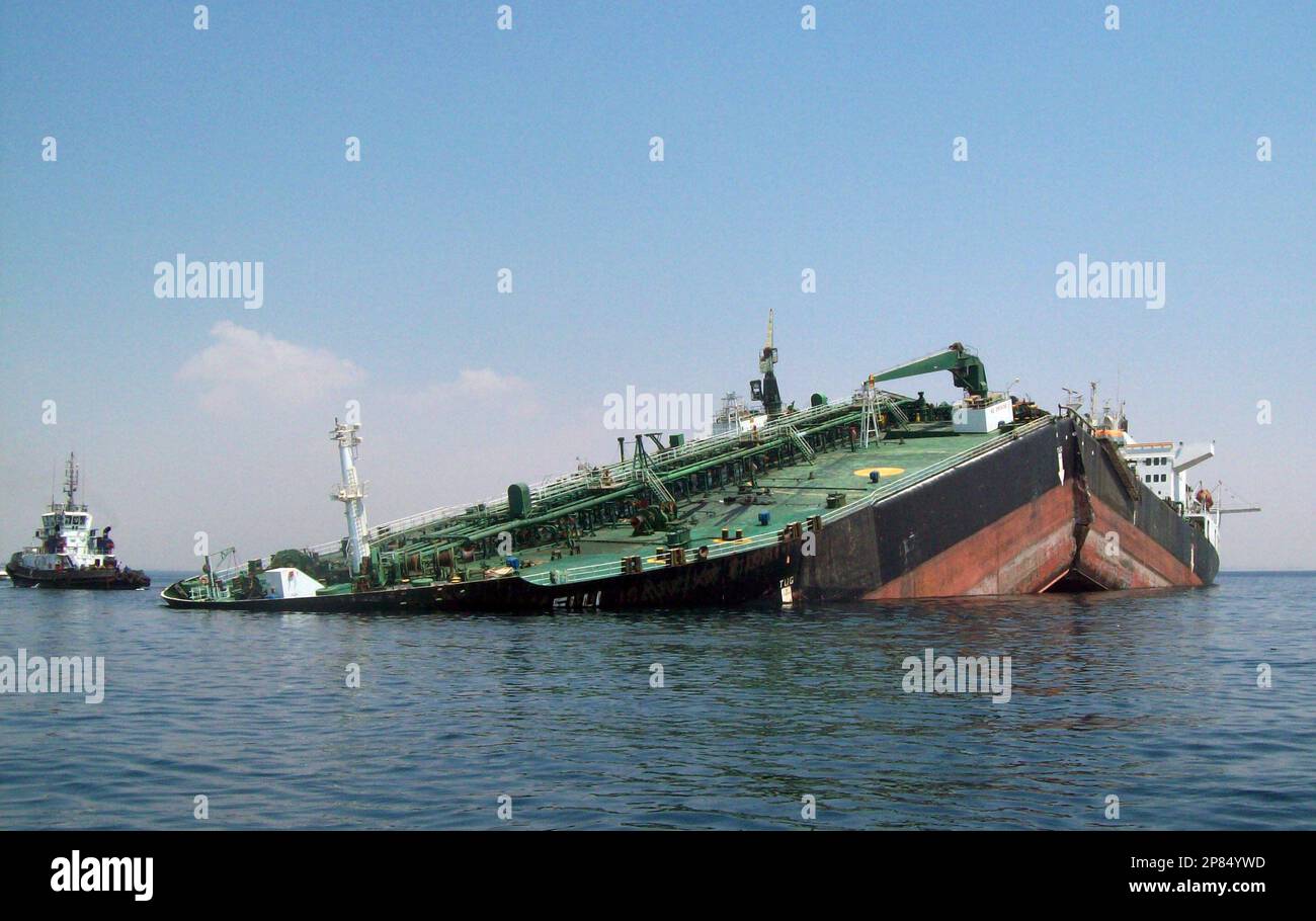 An Egyptian Suez canal pilot boat checks a Panamanian fuel tanker which
