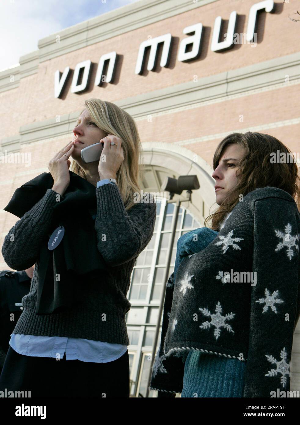 Delores Whitcomb, left, hugs an unidentified Von Maur associate at the Von  Maur department store in Westroads Mall Thursday Dec. 20, 2007 in Omaha,  Neb. The store opened for business after being