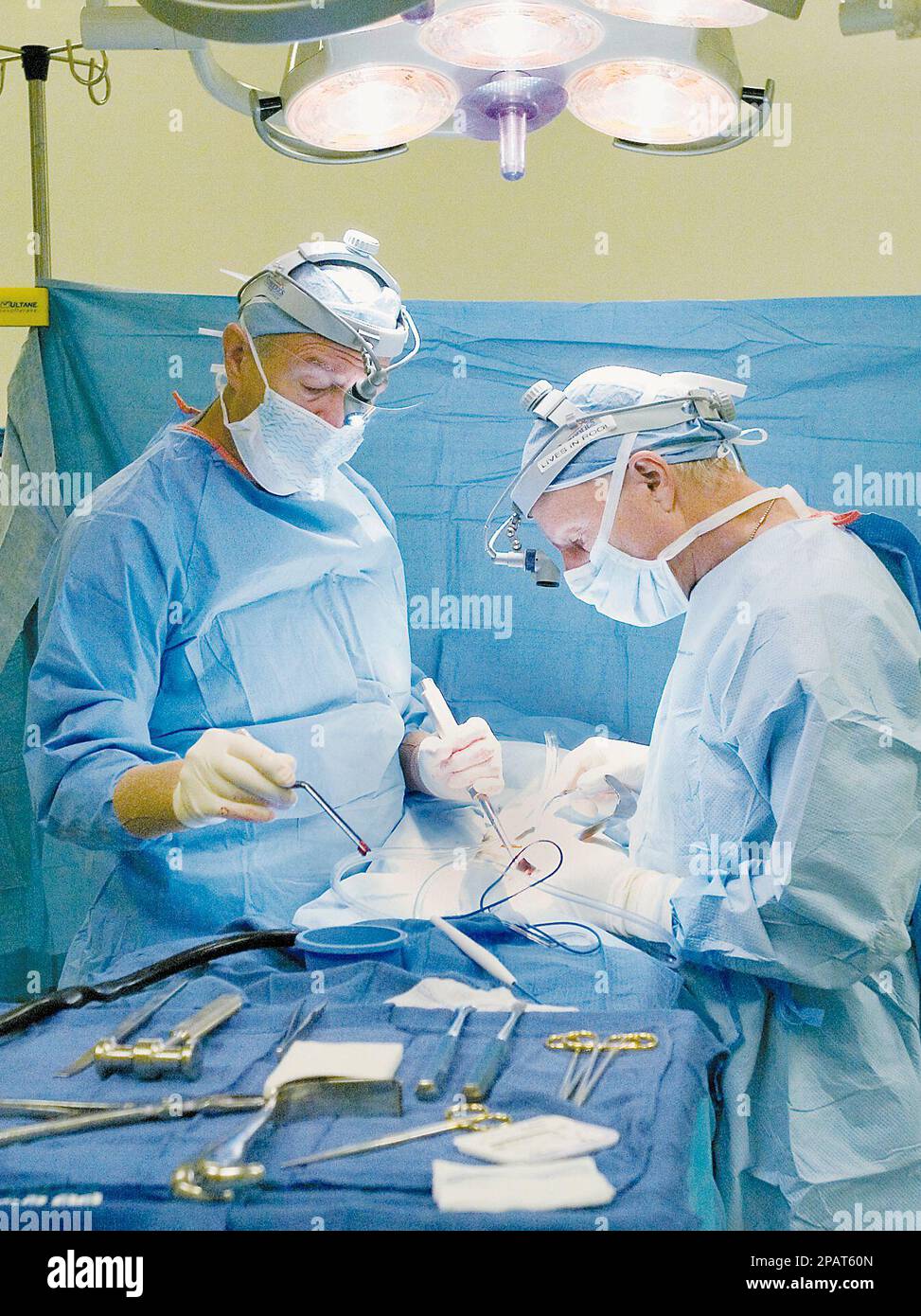 A day in the life of Dr Stephen Faust, left, a surgeon at Anne Arundel