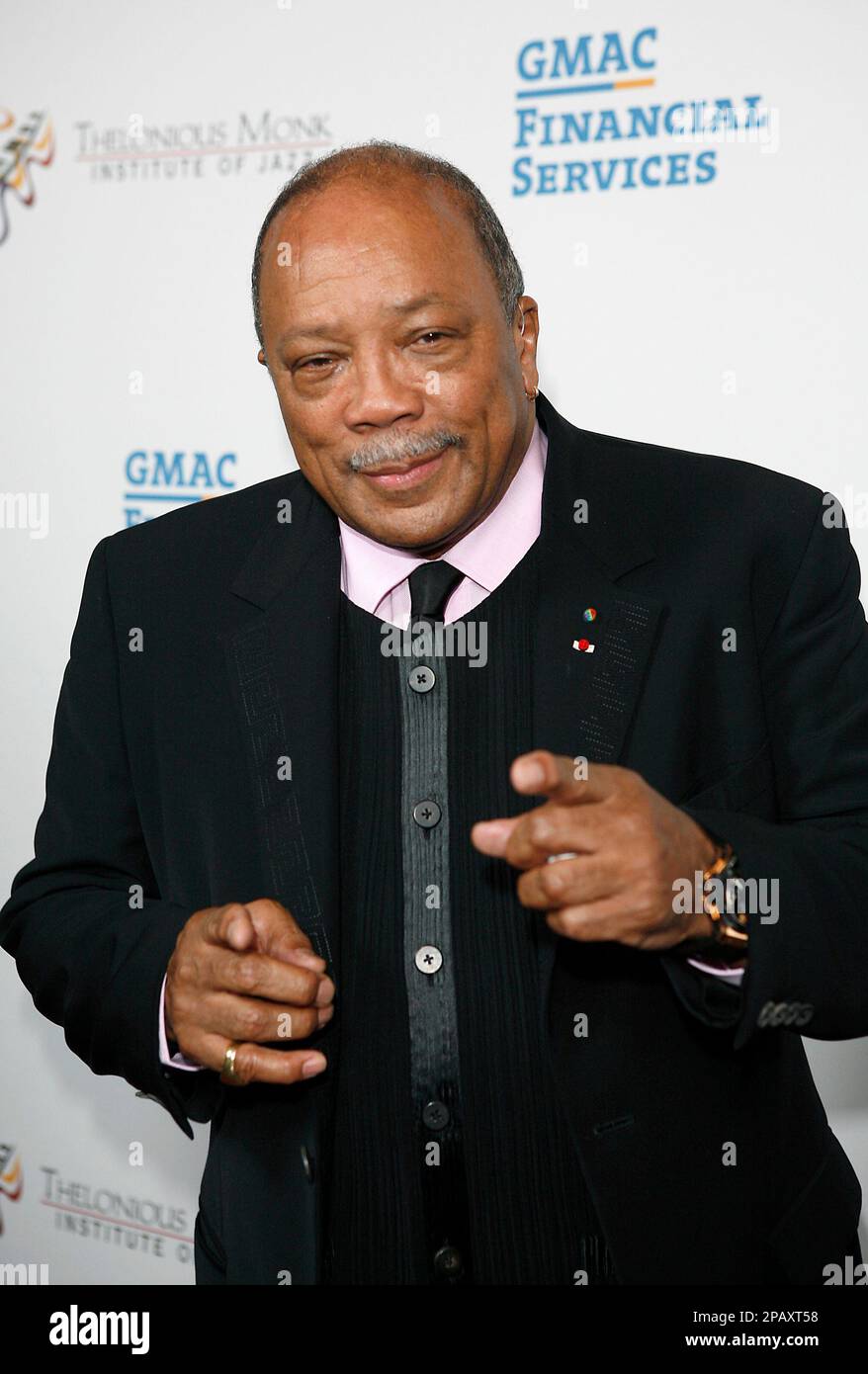 Quincy Jones poses for photographers before an allstar tribute concert