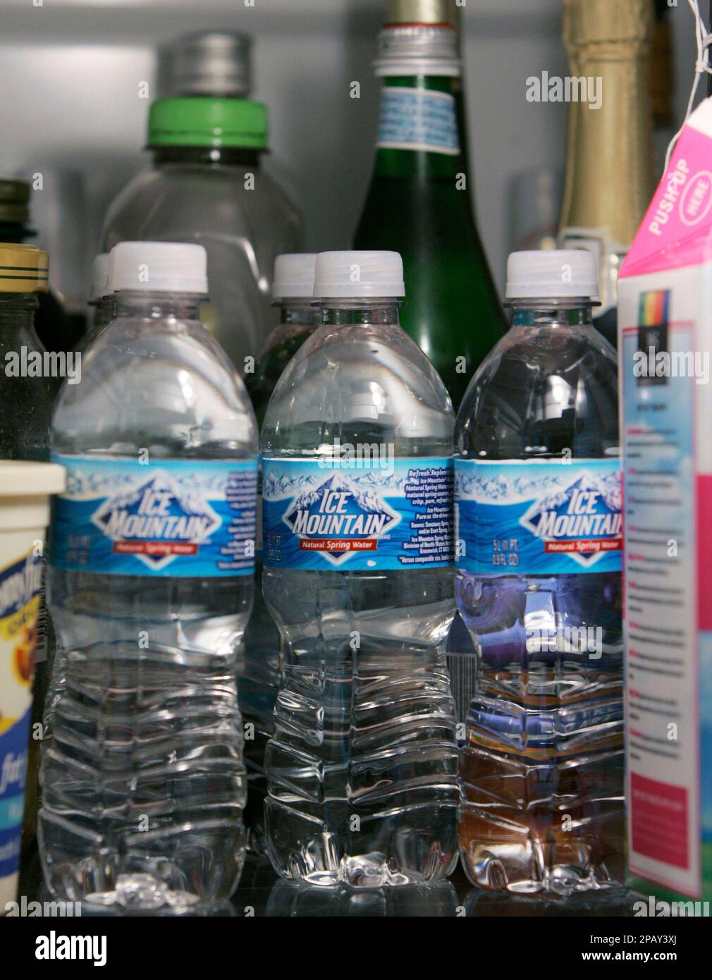 Bottled water is seen in a Chicagoarea refrigerator, Thursday, Oct. 25