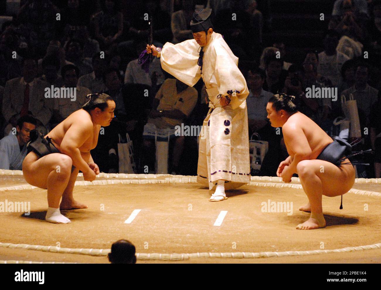 Mongolian grand champion sumo wrestler Asashoryu, left, and grand