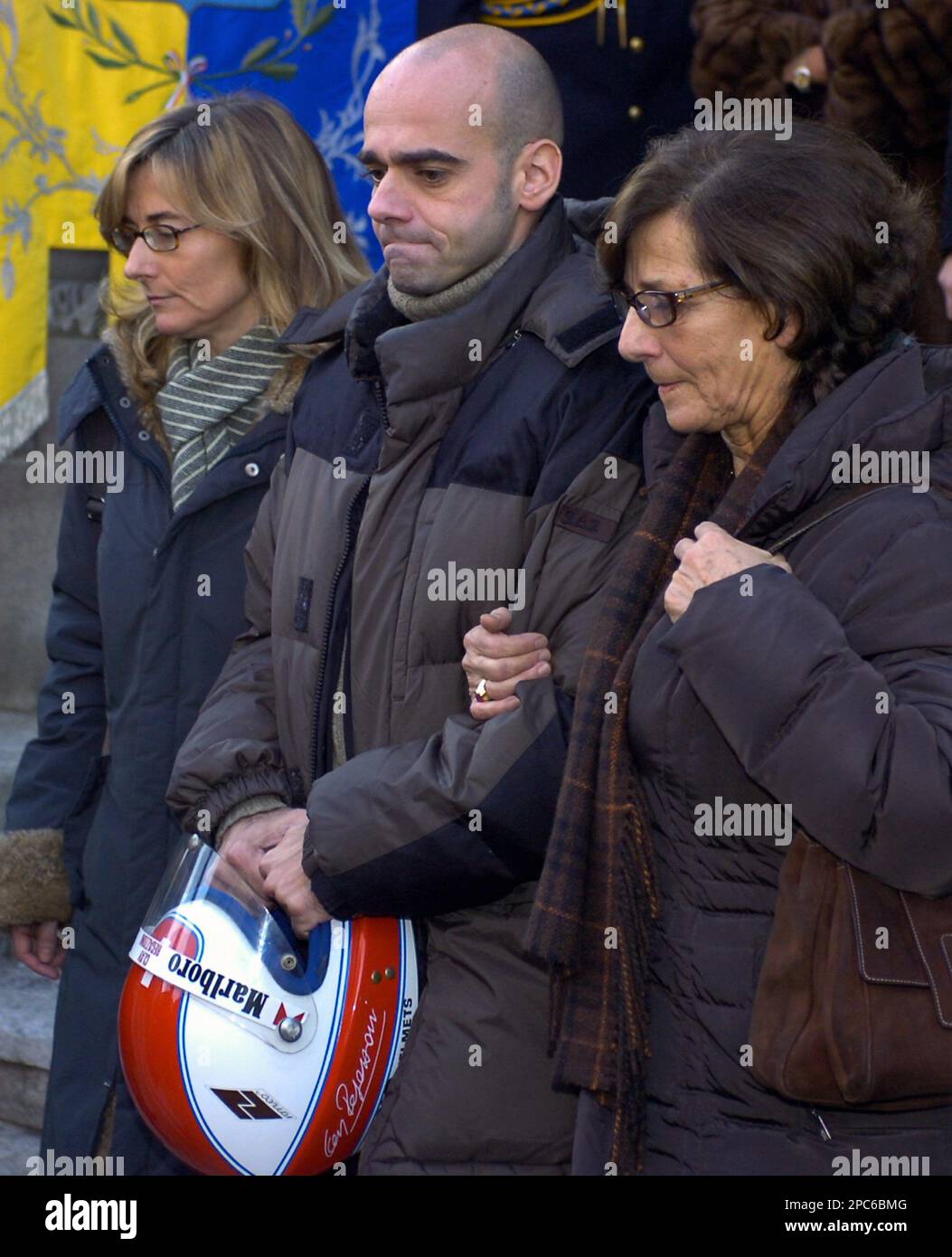 Clay Regazzoni's daughter, Alessia, left, his Son GianMaria, Centre