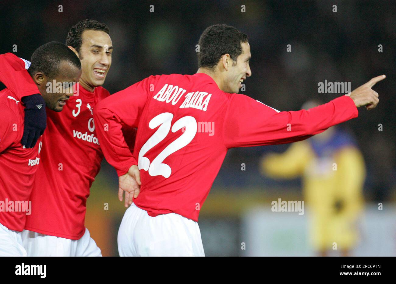 Egypt's Al Ahly's Mohamed Aboutrika, right, reacts after scoring his