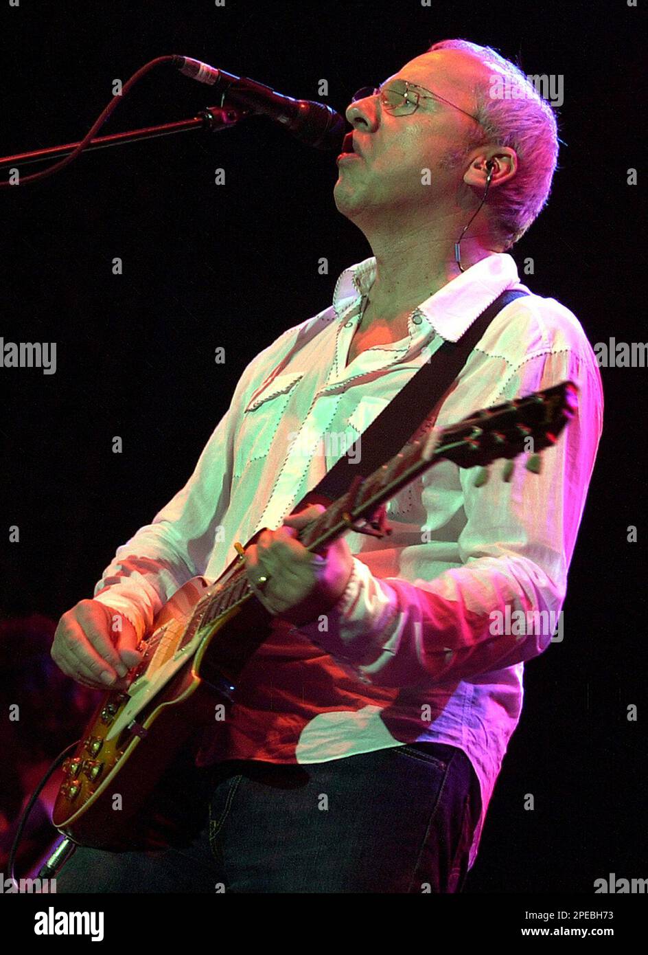 Songwriter and Dire Straits lead guitarist Mark Knopfler performs at a