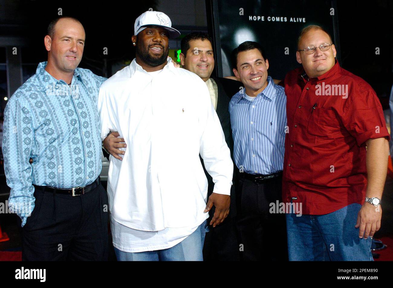 Former members of the 1988 Permian High School football team, from left