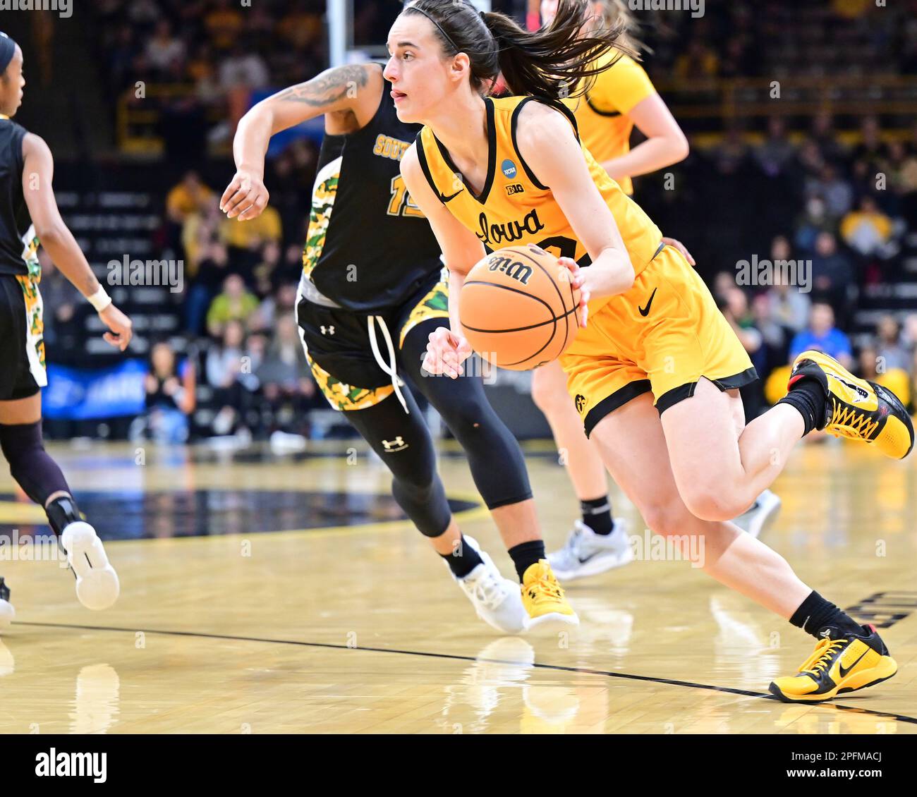 IOWA CITY, IA MARCH 17 Iowa guard Caitlin Clark (22) drives to the