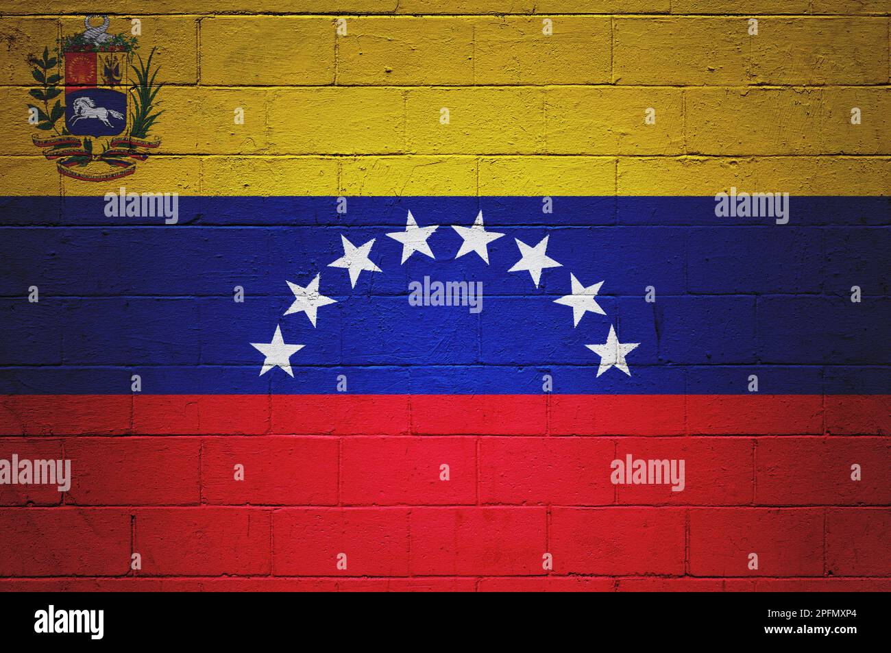 Bandera de Venezuela pintada en una pared de bloque de ceniza. Foto de stock