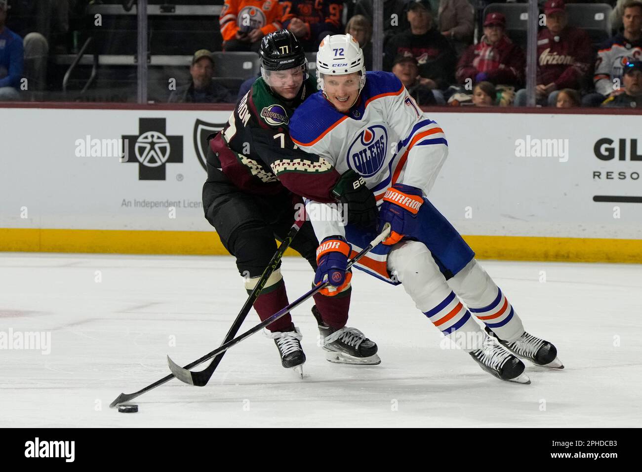 Edmonton Oilers center Nick Bjugstad (72) shields Arizona Coyotes defenseman Victor Soderstrom