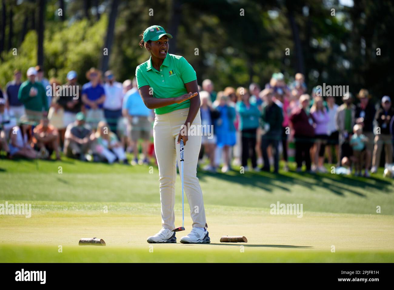 Maya Palanza Gaudin, 13, of East Falmouth, Mass., reacts after putting
