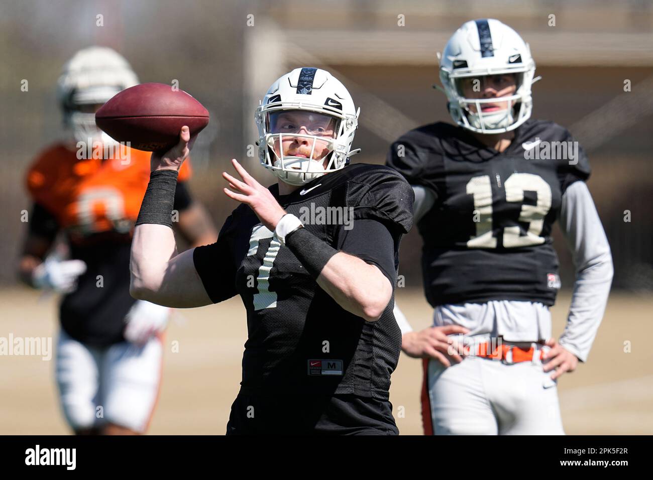 Oklahoma State quarterback Alan Bowman throws during an NCAA college football spring practice