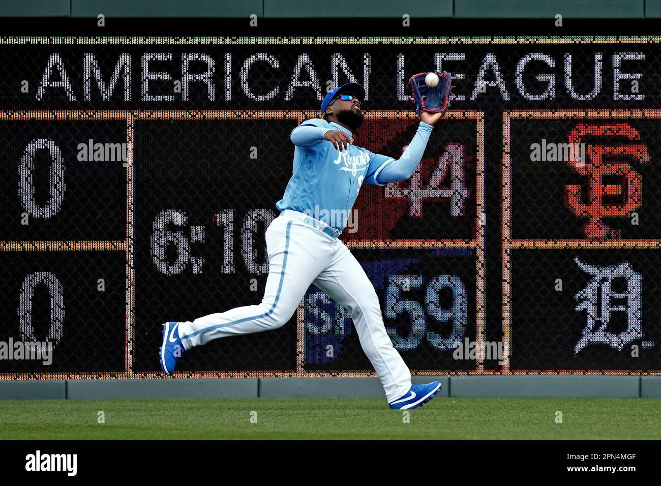 Kansas City Royals left fielder Franmil Reyes catches a fly ball for the out  on Atlanta Braves' Chadwick Tromp during the third inning of a baseball  game Sunday, April 16, 2023, in