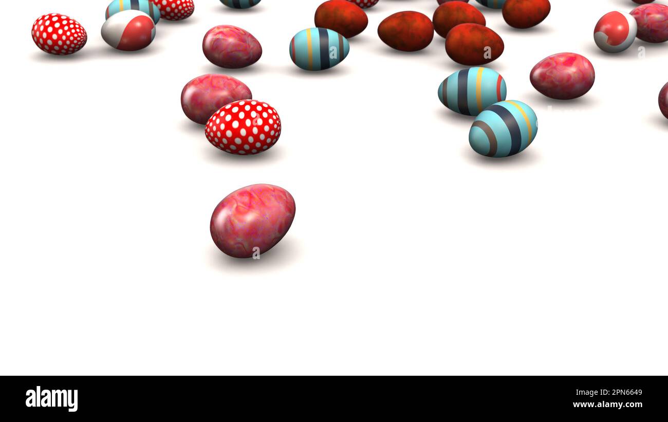 Coloridos huevos de Pascua rodando hacia abajo en la pendiente Foto de stock