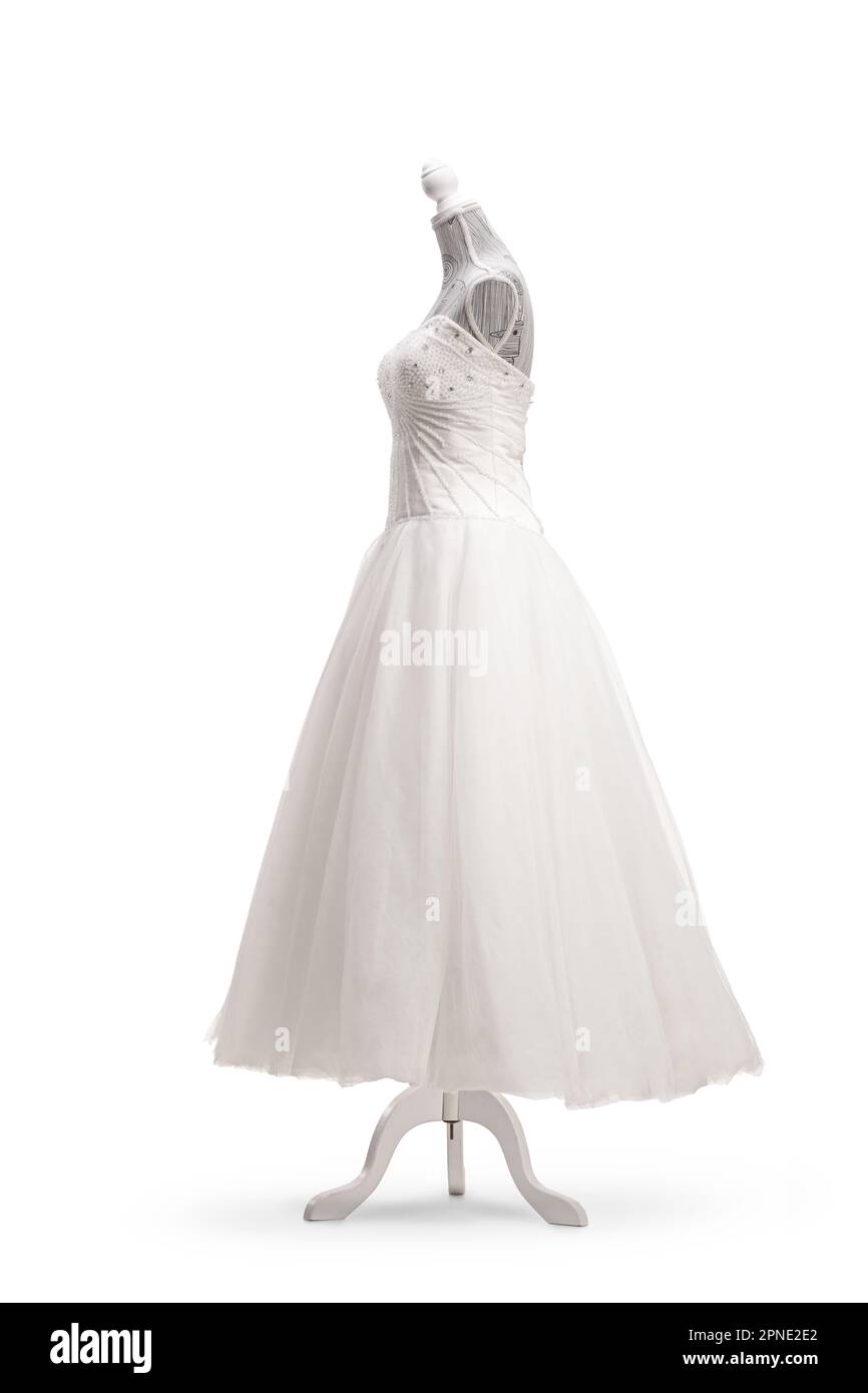 Tiro lateral de un vestido de novia blanco en una muñeca maniquí aislado sobre fondo blanco Foto de stock