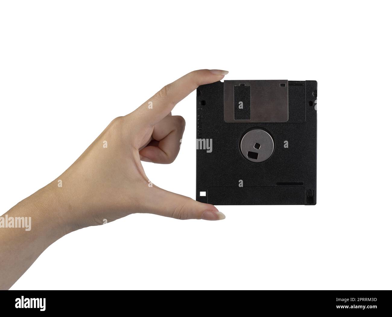 un viejo disquete en la mano femenina sobre un fondo transparente Foto de stock
