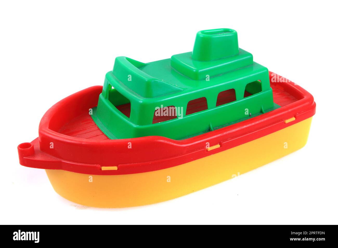 Conveniente Ejercicio Izar juguete plástico del barco del color aislado en el fondo blanco Fotografía  de stock - Alamy