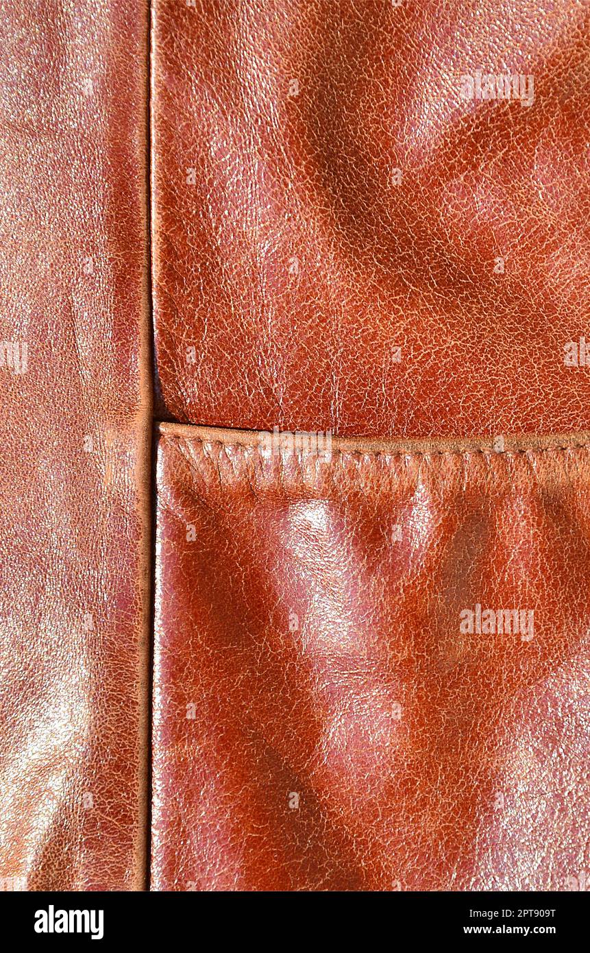 Textura de cuero marrón. Como antecedentes útiles para cualquier trabajo de  diseño. Fotografía macro de ropa hecha de cuero auténtico Fotografía de  stock - Alamy