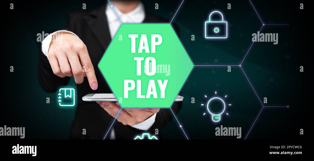 Signo que muestra Tap to Play. Concepto de negocio Toque la pantalla para comenzar a jugar un juego o algo más Foto de stock