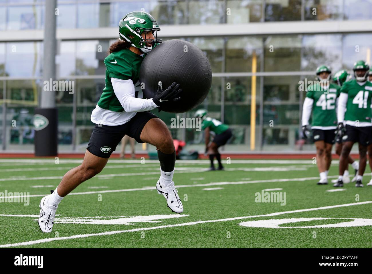 New York Jets linebacker Maalik Hall (46) runs a drill during the team