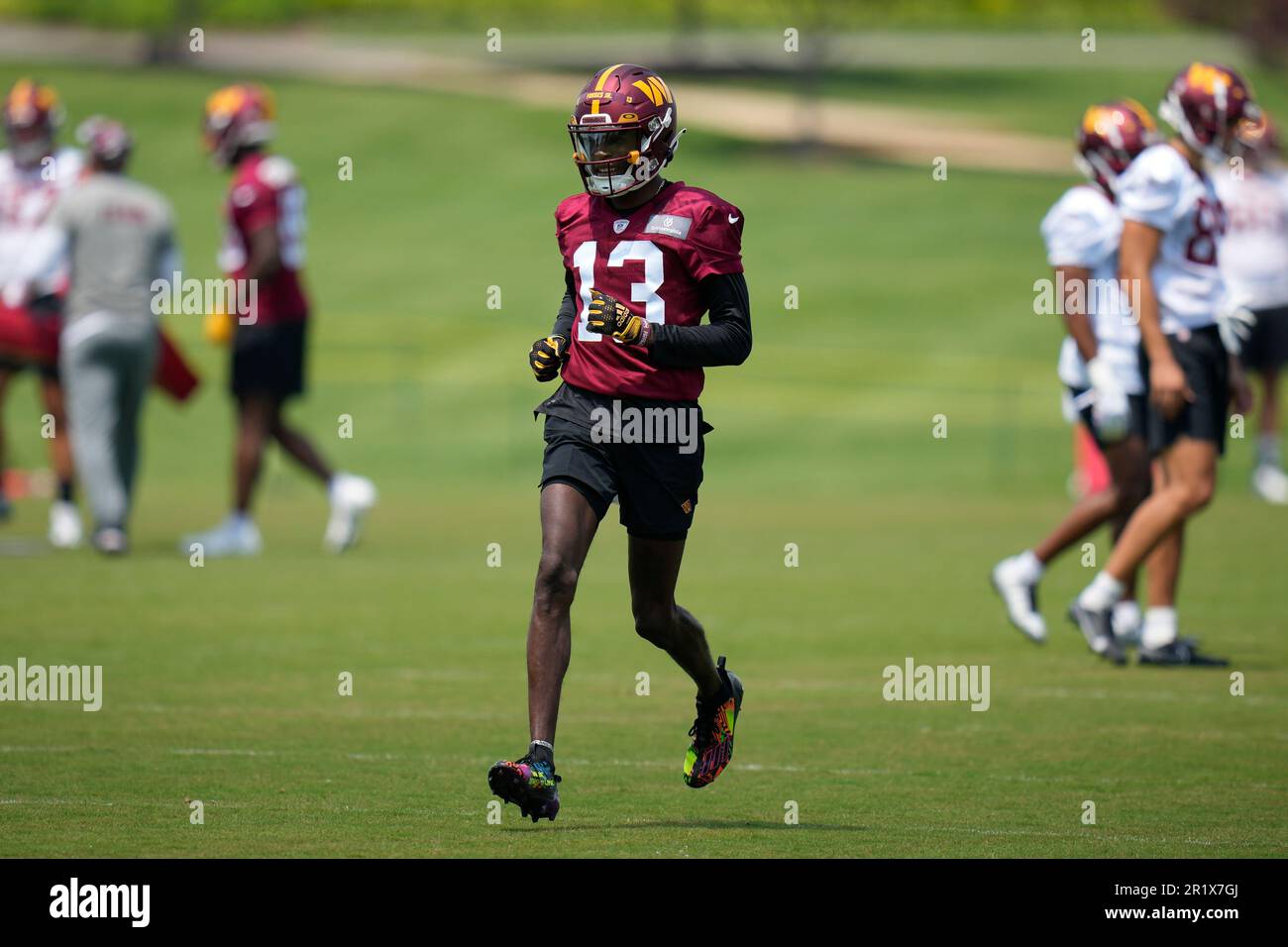 Washington Commanders cornerback Emmanuel Forbes Jr., (13) runs a drill