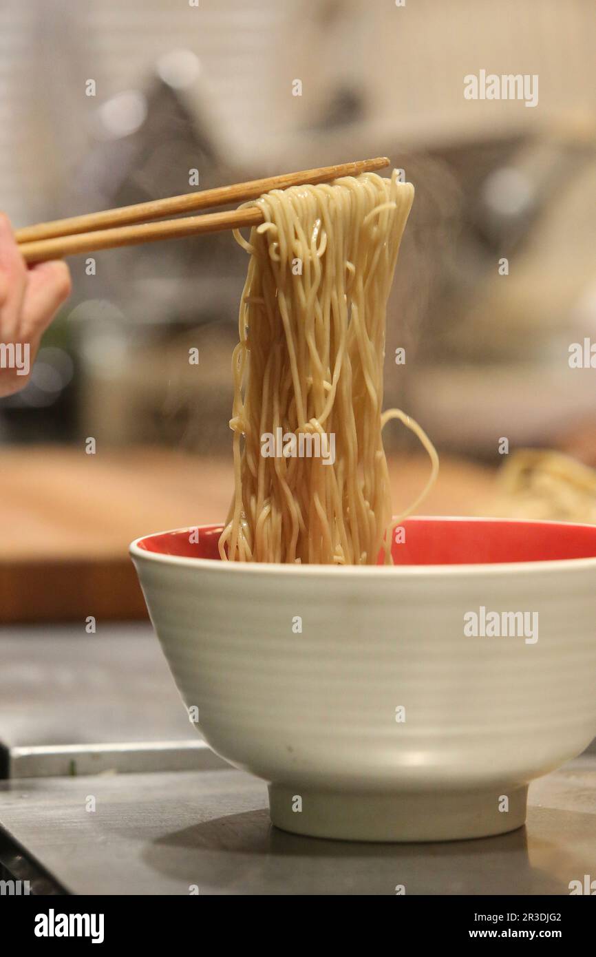 Bobby Siu, executive chef and manager, turns the soba while making a bowl of Tsuta's signature