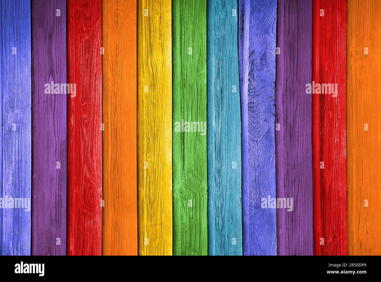 Viejos tablones en los colores del arco iris fondo de madera colorido