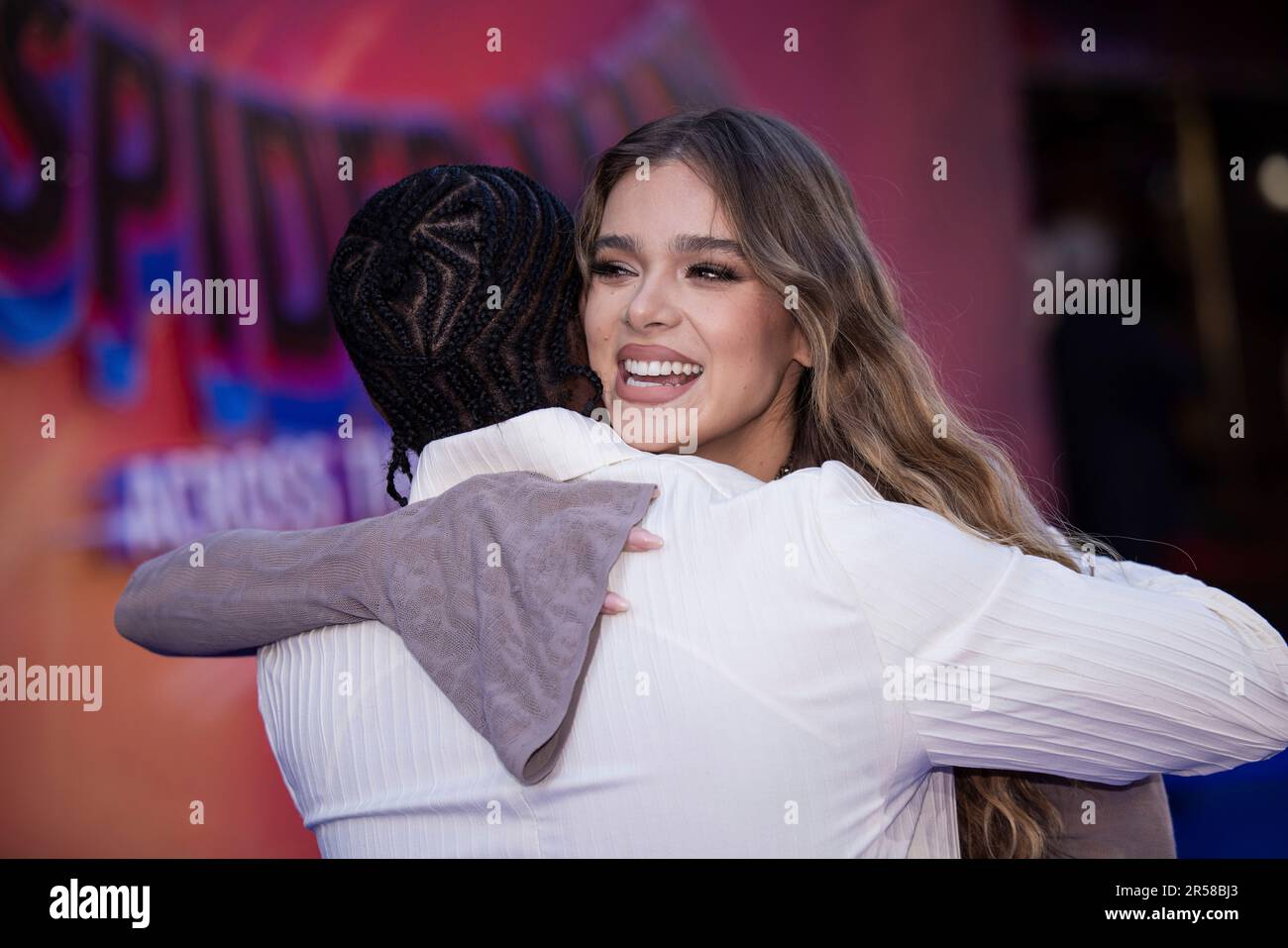 Shameik Moore and Hailee Steinfeld pose for photographers upon arrival