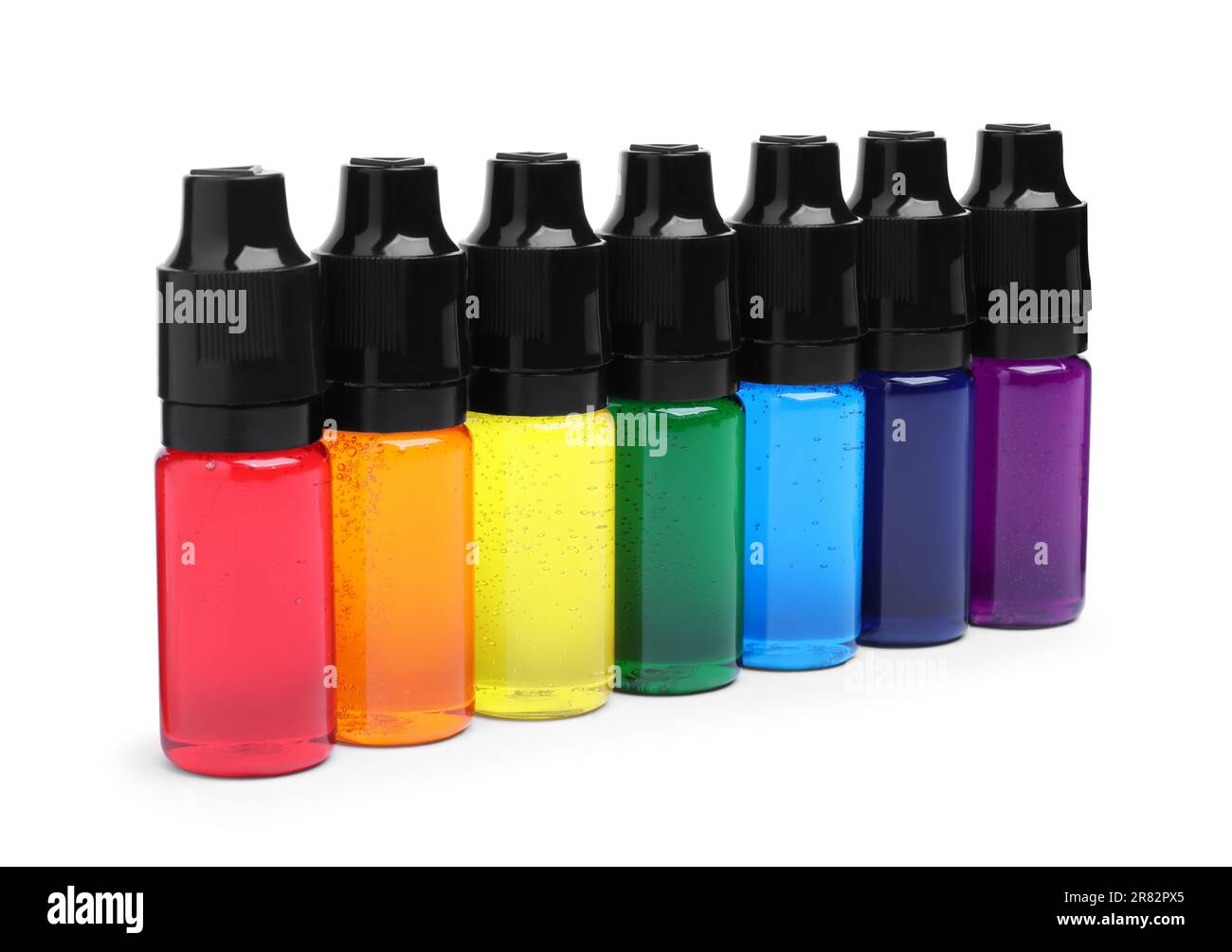 4 frascos de colorantes alimentarios aislados sobre fondo blanco Fotografía  de stock - Alamy