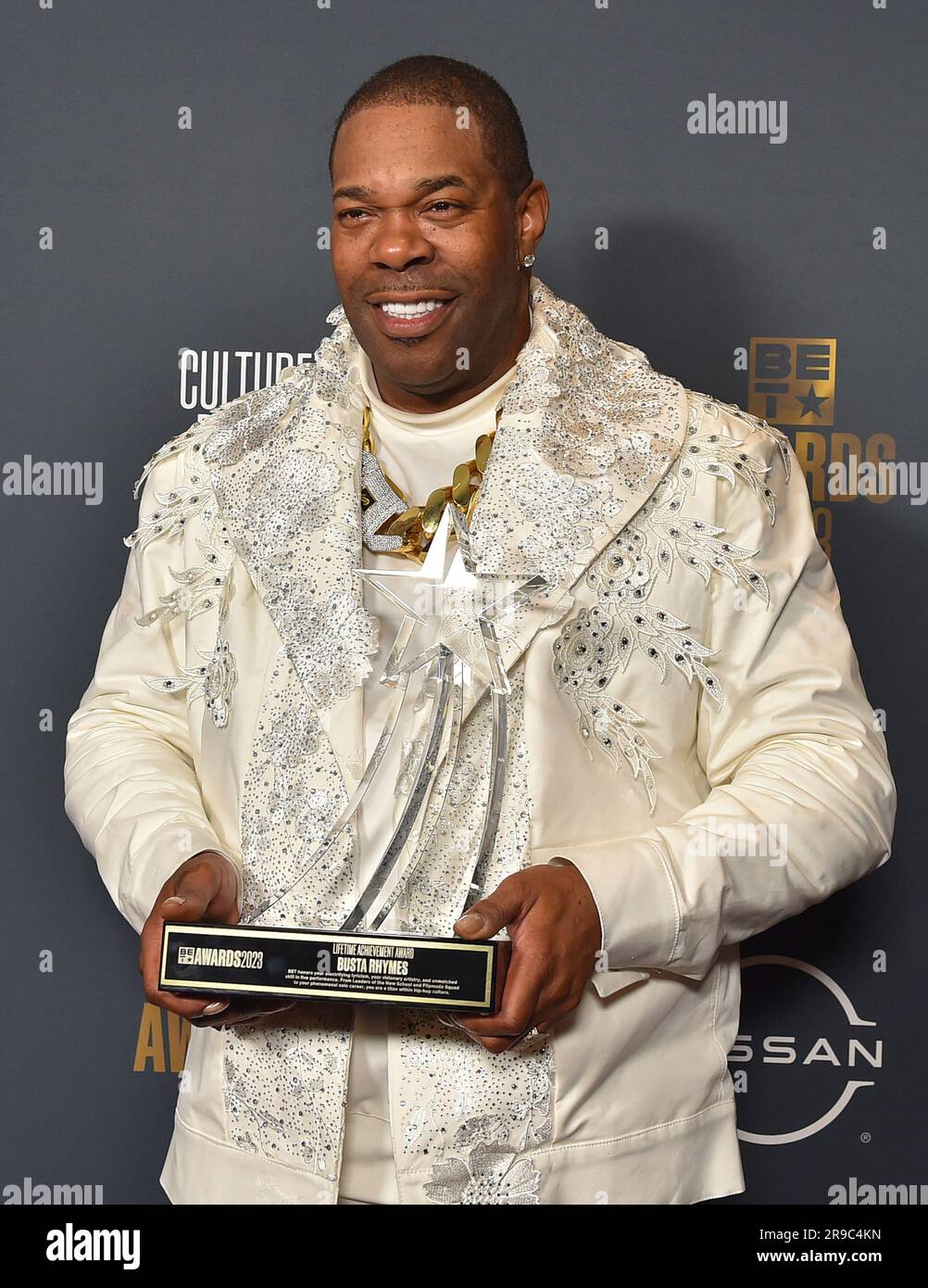 Busta Rhymes poses in the press room with the lifetime achievement