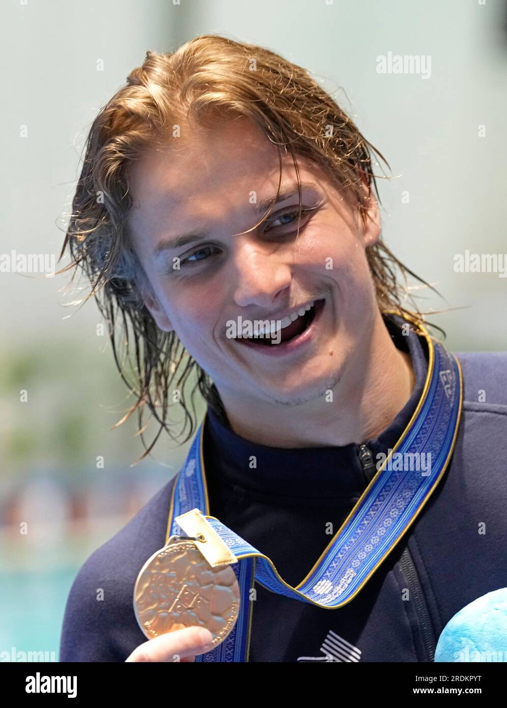 Cassiel Rousseau of Australia celebrates with his gold medal after