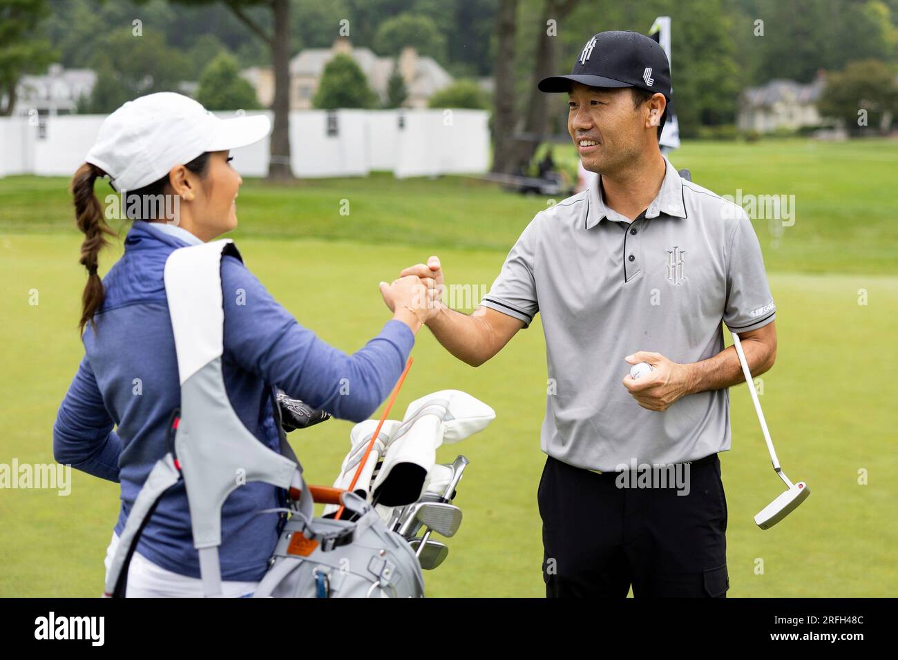 Captain Kevin Na of Iron Heads GC and LIV Golf Broadcast member, Su-Ann