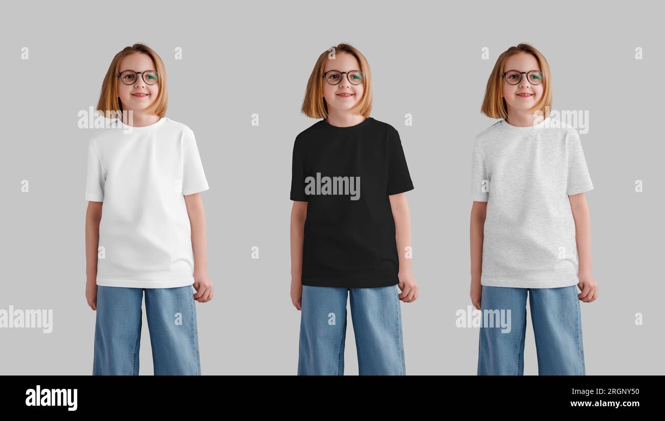 niña sonriente en blanco camiseta blanca de pie en el parque Fotografía de  stock - Alamy