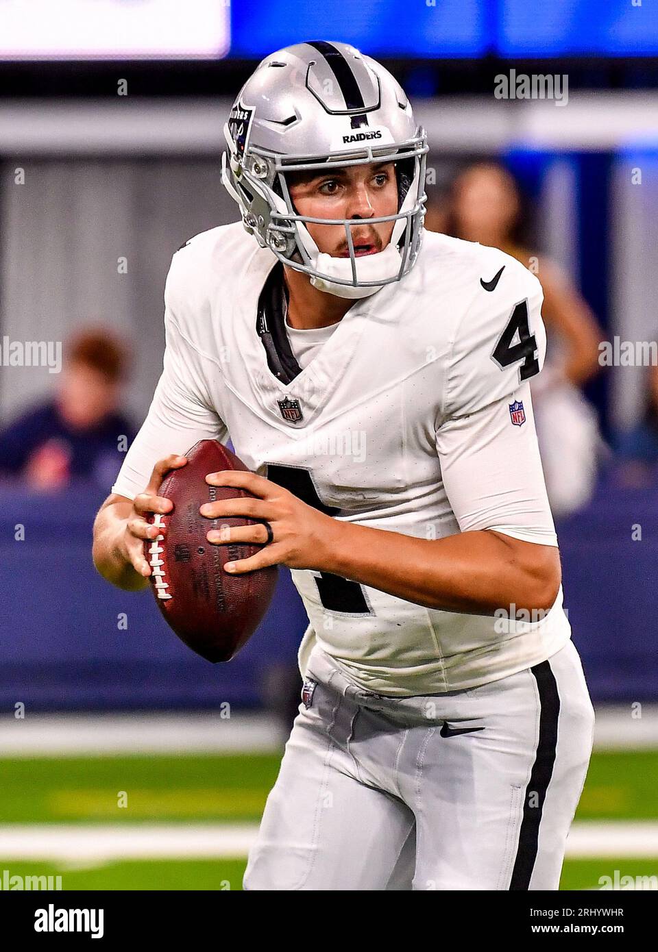 Las Vegas Raiders quarterback Aidan O'Connell (4) gestures as he warms up  before the first half of a preseason NFL football game against the Dallas  Cowboys in Arlington, Texas, Saturday, Aug. 26