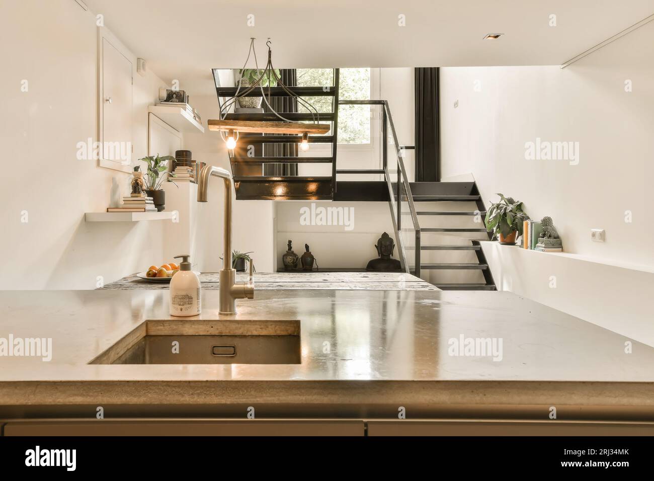 el interior de un pequeño cocina con un comida mesa y un escalera líder a  el segundo piso. generado por ai 31130031 Foto de stock en Vecteezy