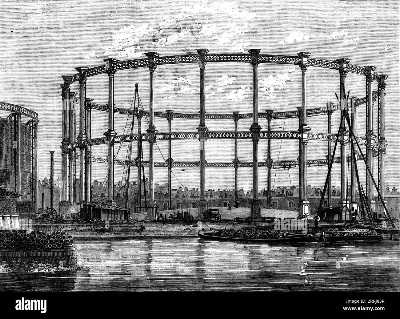 El Gran Gasholder en las Obras de la Compañía Imperial de Gas, Bethnal-Green, 1858. '...las dimensiones de los gasholders han aumentado de una capacidad de 40.000 pies cúbicos a 2.500.000 pies cúbicos... el trabajo se construye a partir de [los] diseños... del Sr. Joseph Clark, el ingeniero de la compañía... El tanque es de ladrillo y piedra, mide 204 pies de diámetro, y 41&#xbd; pies de profundidad...En la construcción del tanque y los muelles se emplearon 2.000.000 ladrillos y 5000 pies cúbicos de piedra...Este trabajo, permitido ser el mejor espécimen de ladrillo hidráulico de la actualidad, fue ejecutado por el Sr. John Aird, Emers Foto de stock