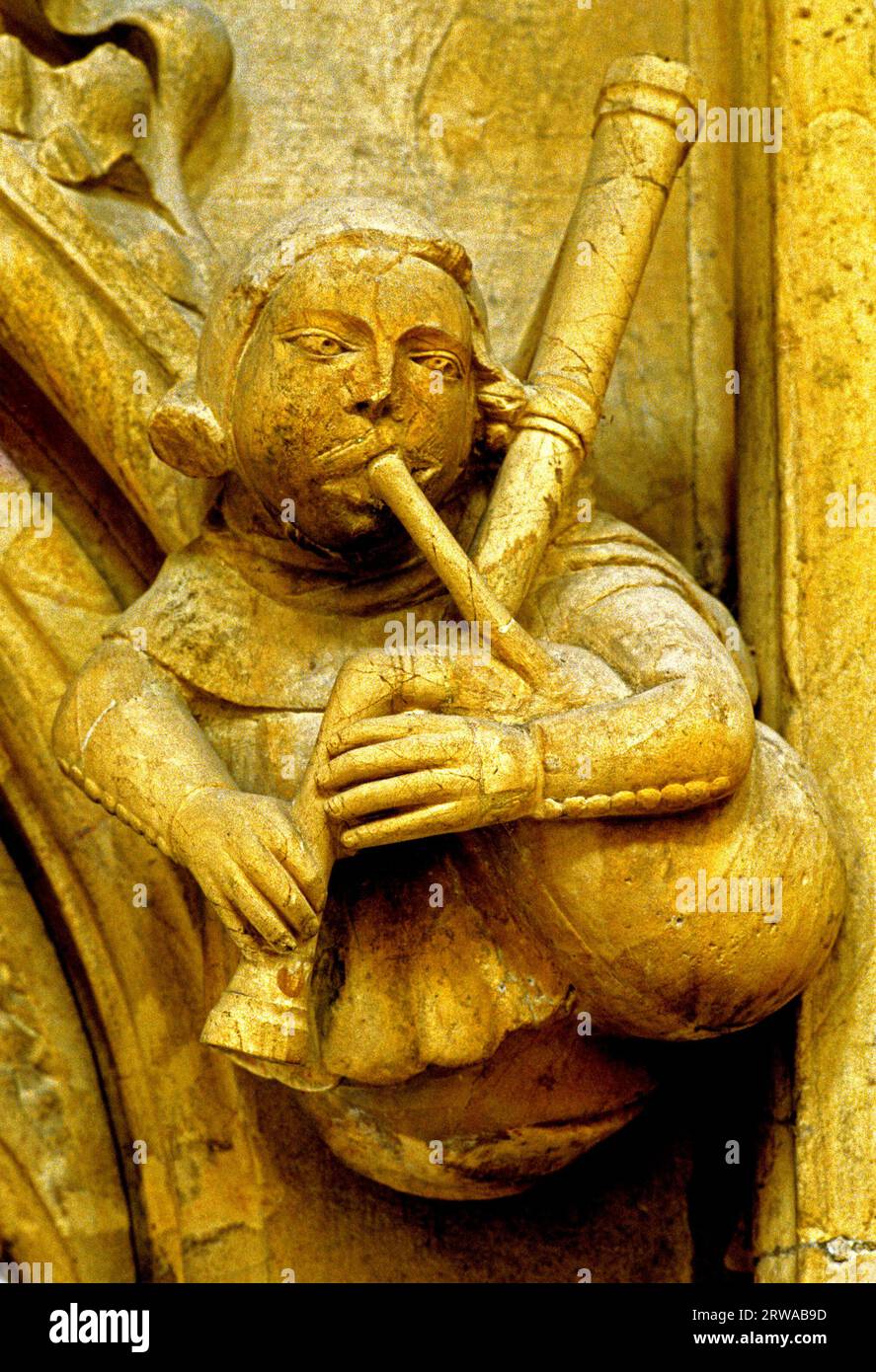 Beverley Minster, talla de piedra medieval, músico, gaitas, musical, Yorkshire, Inglaterra Foto de stock
