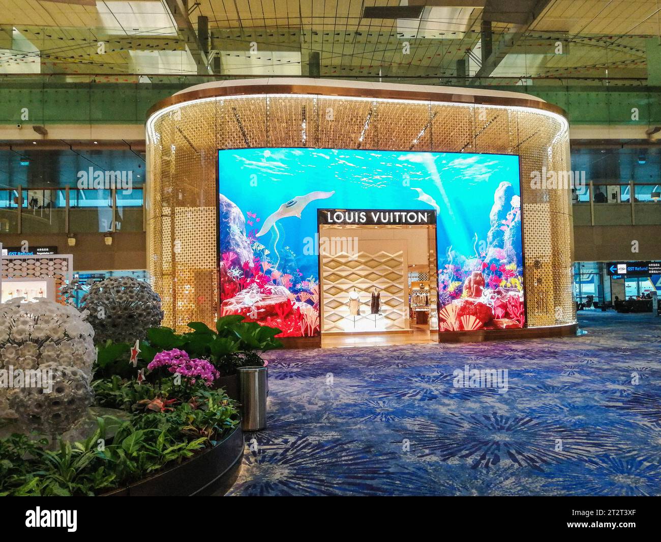Singapur, aeropuerto de Changi, tienda Louis Vuitton Foto de stock
