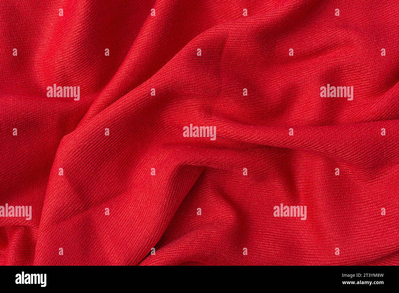 crumpled fondo de textura de tela rosa closeup Foto de stock